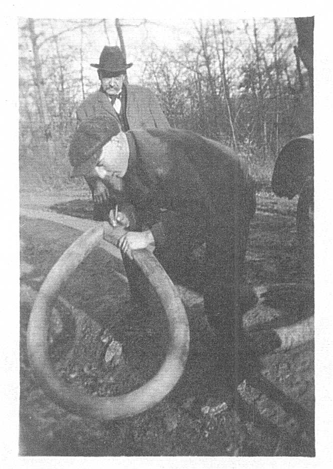 Bruce Clawson fixing tire